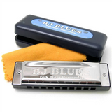 A BJ Blues branded folk harmonica in the key of C, with a yellow cleaning cloth and a black plastic case.