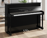Polished Black Yamaha b2-PEC piano with polished chrome fittings in a living room setting