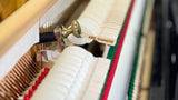 Danemann upright piano hammers and interior
